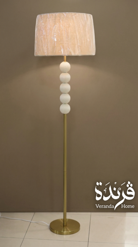 اضاءة جانبية معدن ذهبي مع كرات حجر