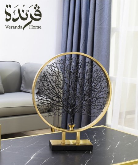 تحفة شجرة مع اطار ذهبي