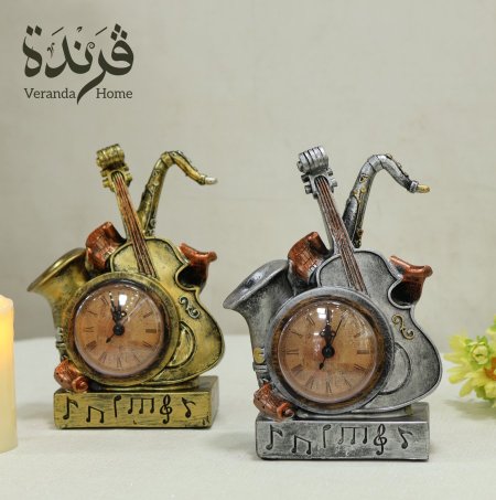 تحفة الات موسيقية مع ساعة