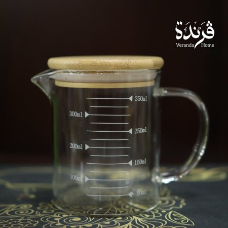 ابريق زجاج مع عيارات
