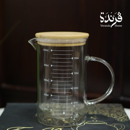 ابريق زجاج مع عيارات